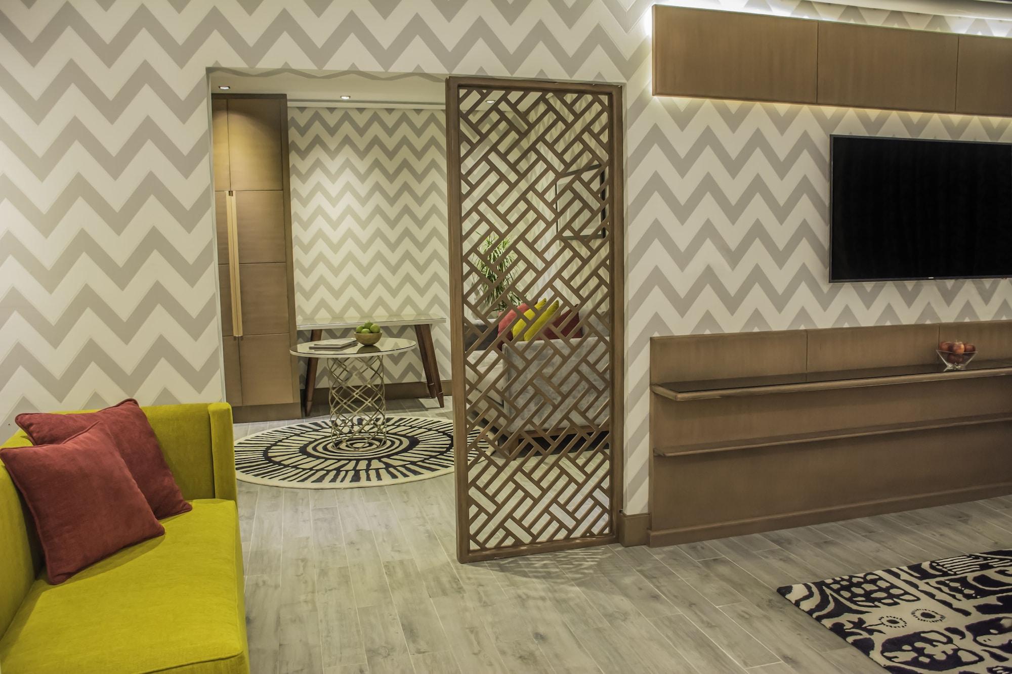 Radisson Blu Resort, Al Khobar Teluk Bulan Sabit Bagian luar foto A room divider in a living room